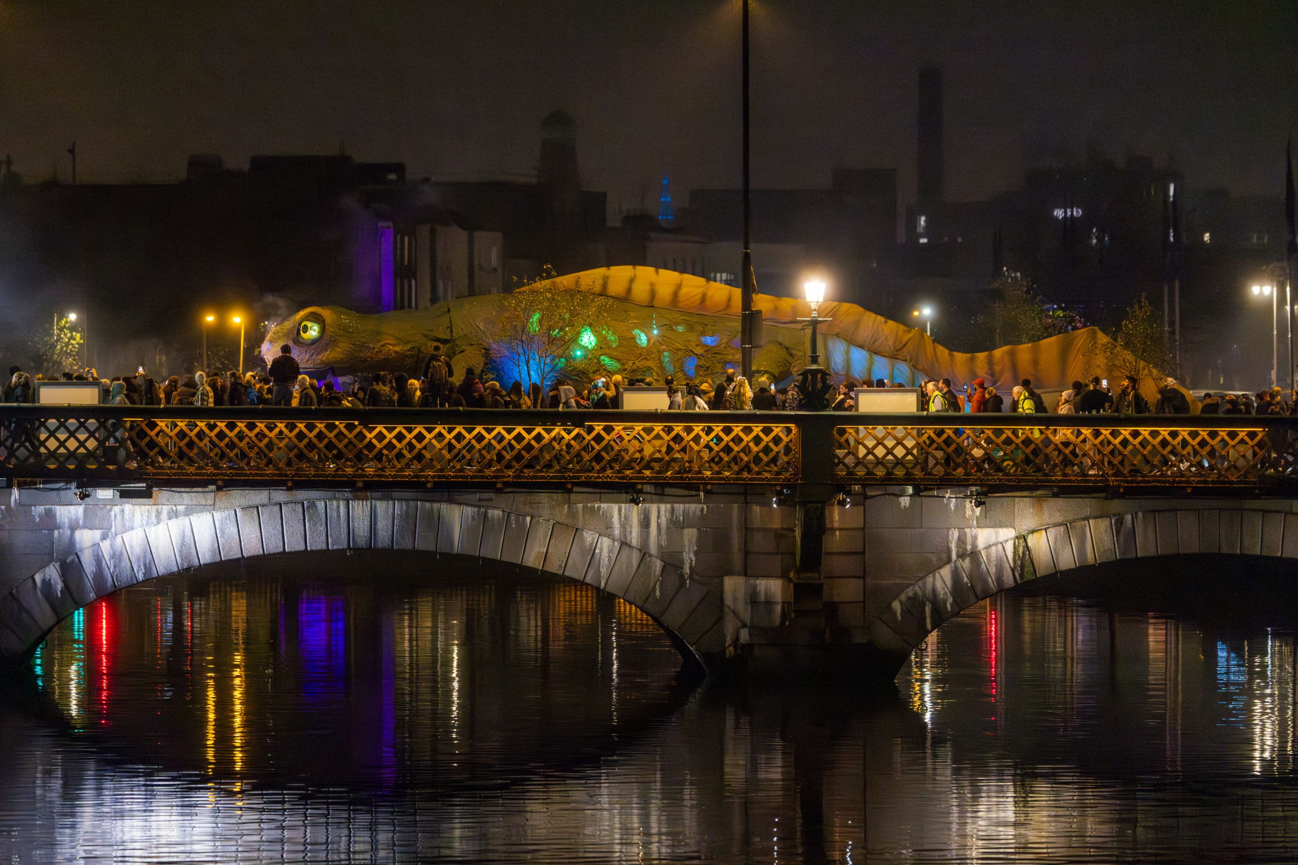 City bridge with parade crossing